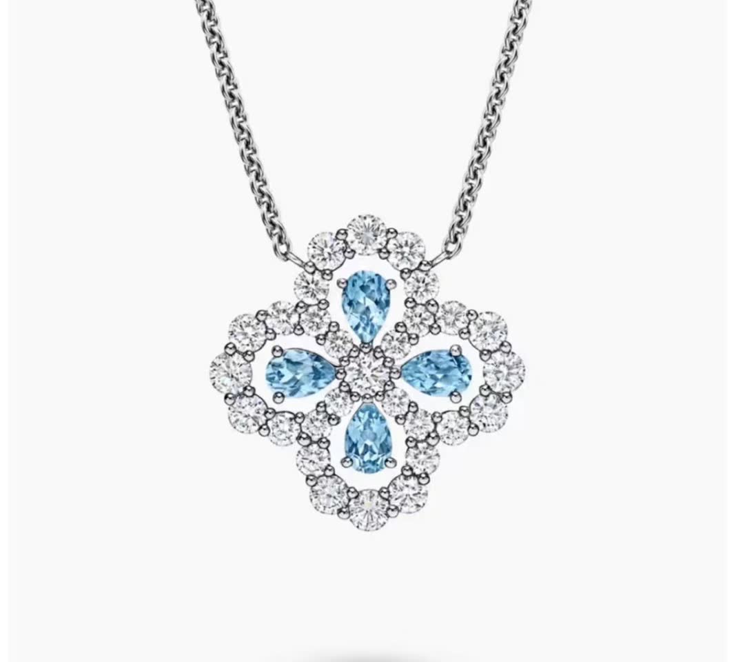 Van Cleef & Arpels Elegant Blue Diamond Flower Pendant